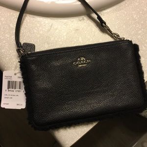 Black leather coach wristlet
